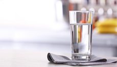 A glass of purified water on dining table